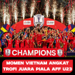 Pemain Vietnam mengangkat trofi juara Piala AFF U23 2025 dengan latar kembang api dan selebrasi kemenangan